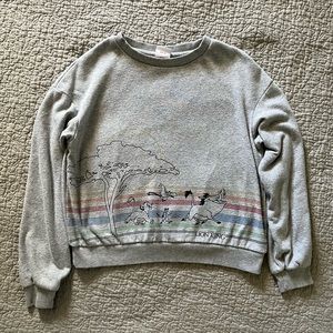 grey sweatshirt with lion king design